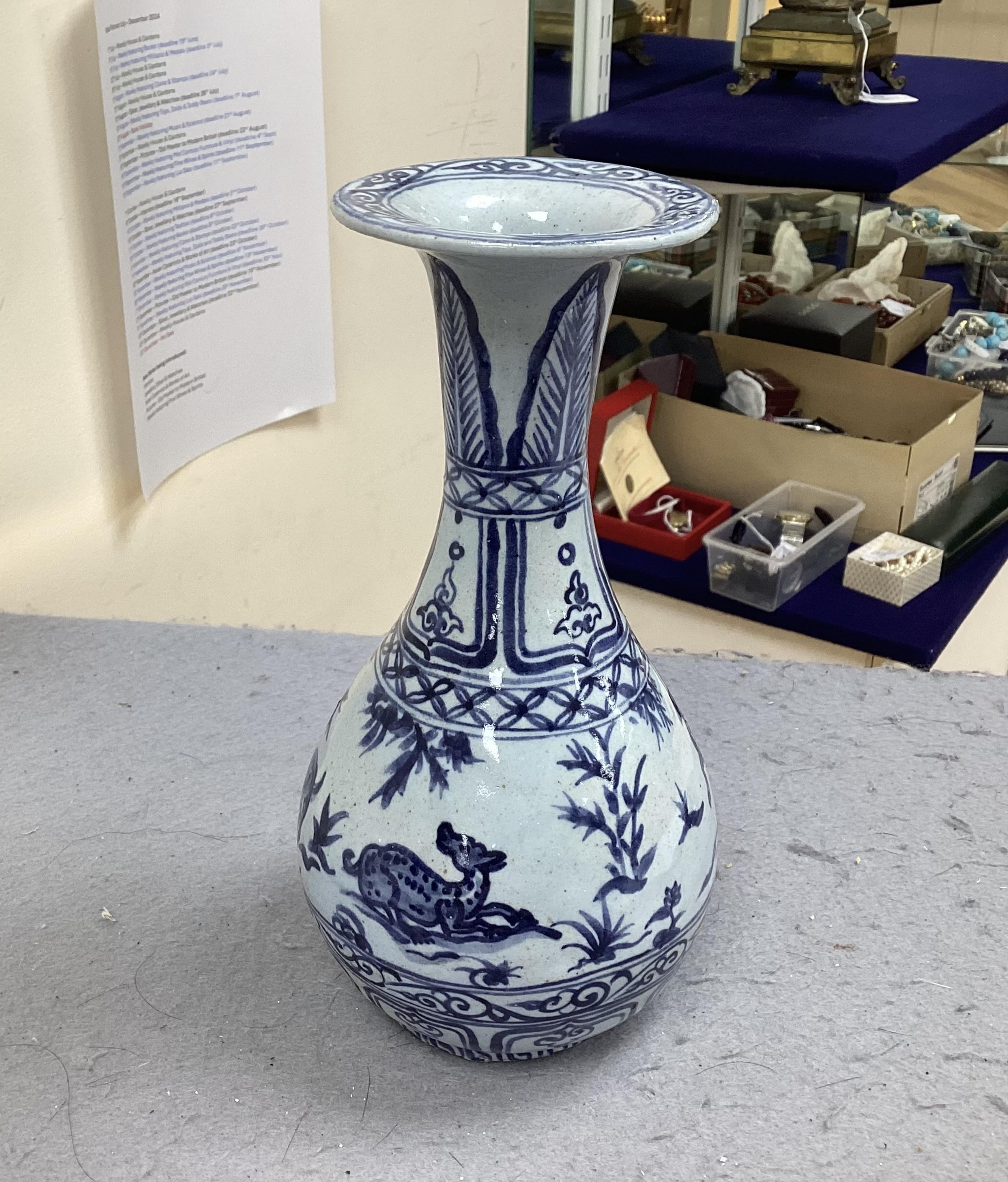 A group Oriental ceramics including Chinese famille rose plates, various tea bowls, a teapot, vases etc., tallest blue and white vase 21.5cm high (28). Condition - fair